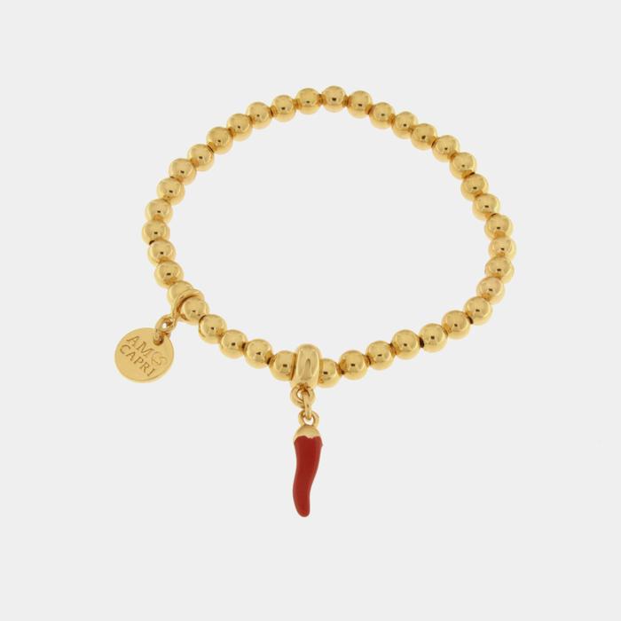 Bracelet en métal avec corne rouge