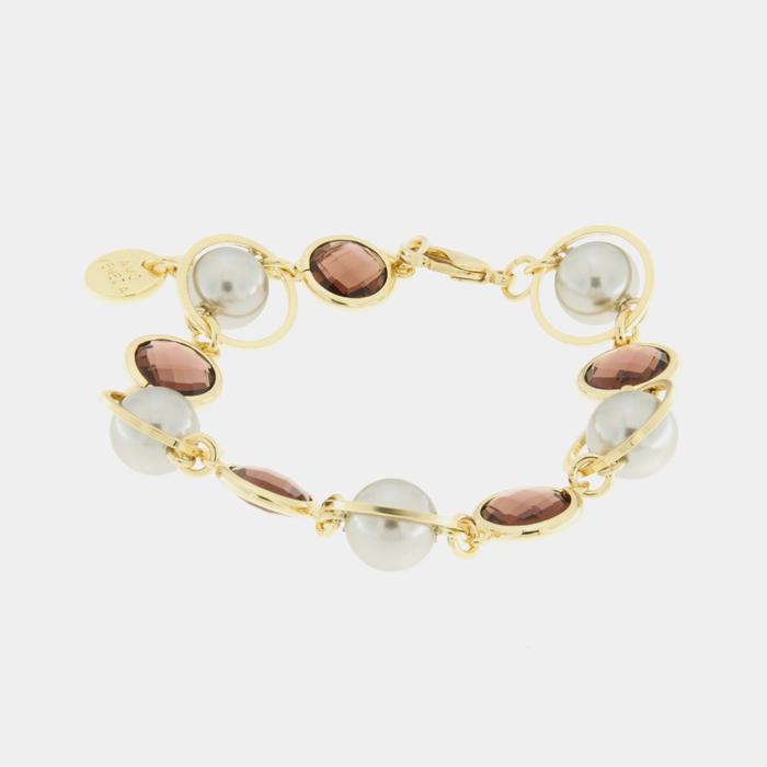 Metal bracelet with brown crystals, circles and beads