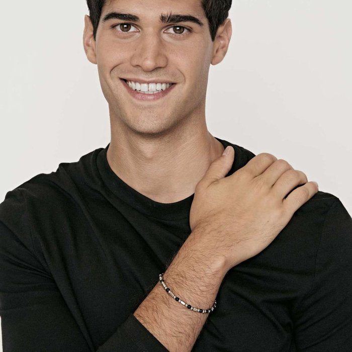 Bracelet en acier avec éléments noirs