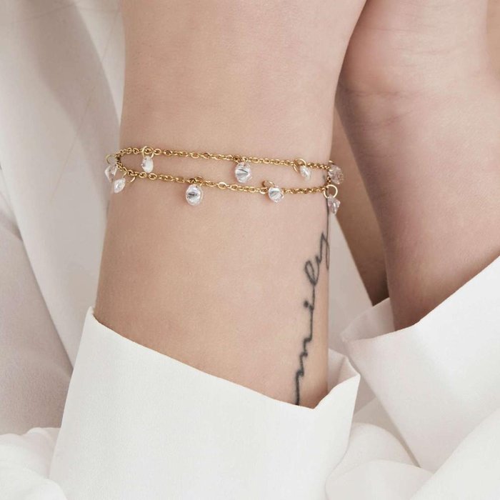 Bracelet en acier doré IP avec cristaux blancs