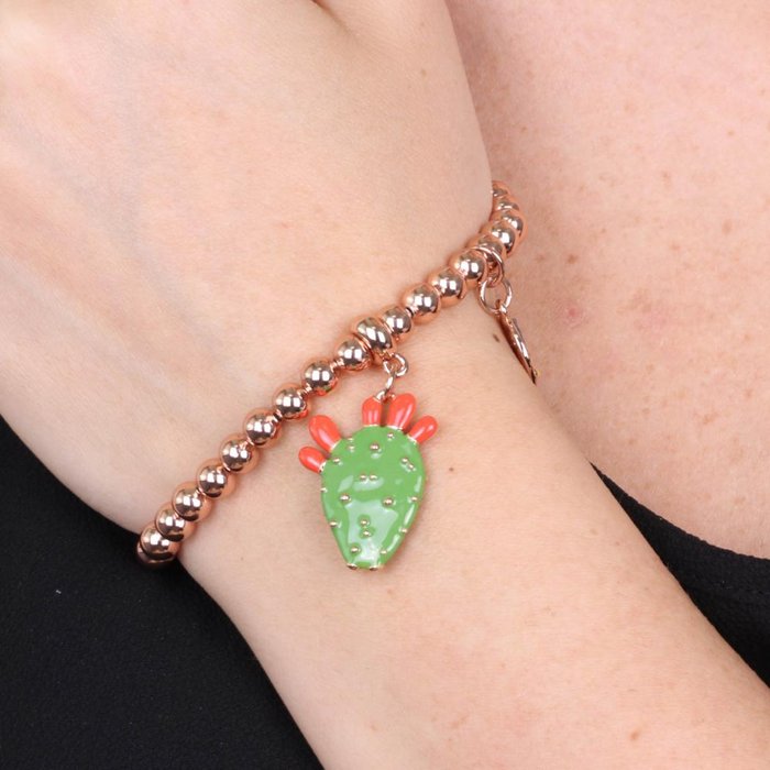 Bracelet en métal à maille sphérique, avec pendentif en forme de figue de barbarie, orné d'émail vert et de pointes en émail rouge