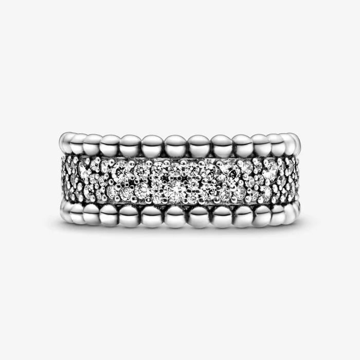 Bague avec pavé décoré de sphères