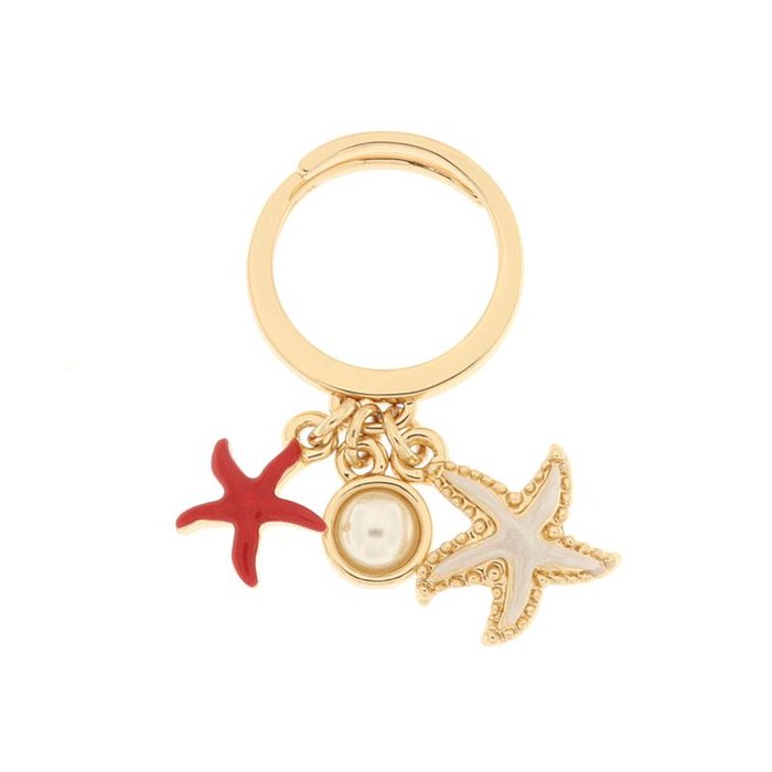 Bague en métal avec étoile de mer et cristal