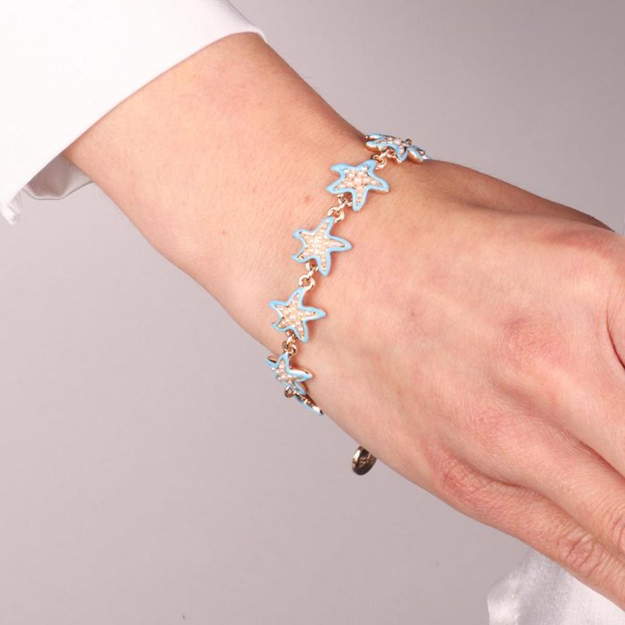 Bracelet en métal avec étoile de mer bleue